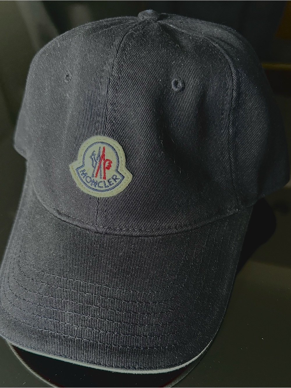 Moncler Navy Cap with Cream Patch and Red Detail